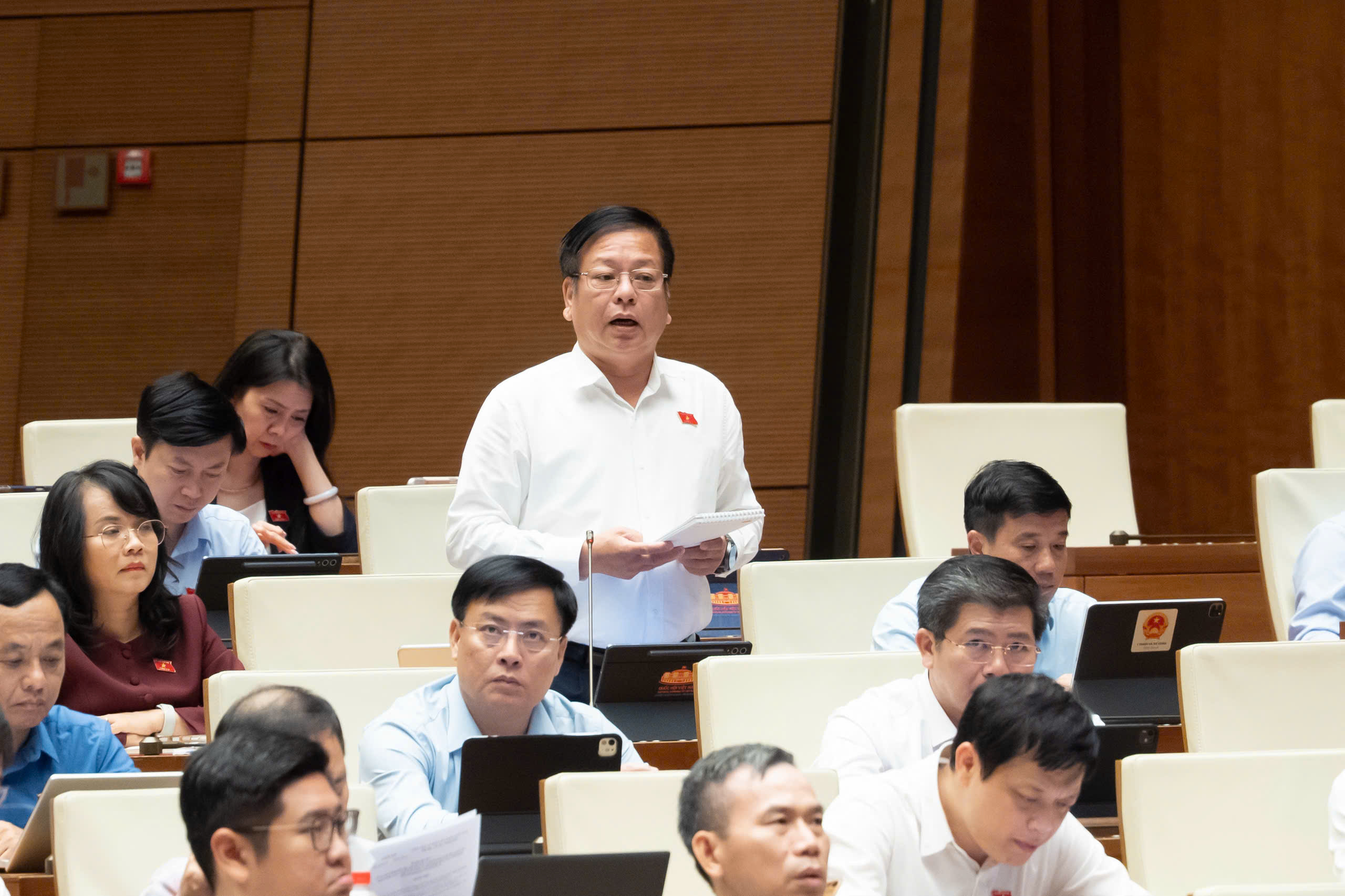 Quốc hội tranh luận về phạm vi bồi thường thiệt hại trong quản lý thuế - Ảnh 3.