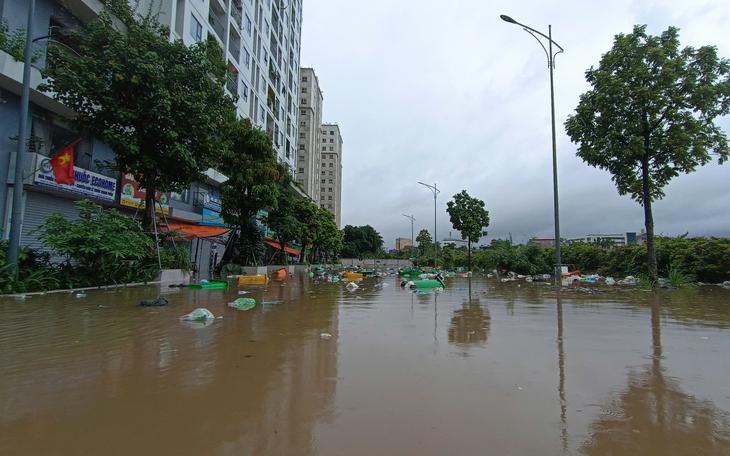 Áp thấp nhiệt đới gây sóng biển cao 4m, 8 tỉnh thành khẩn trương ứng phó - Ảnh 2.